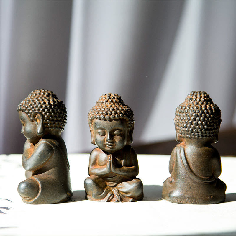 Small Sakyamuni Statue – statue on small cushion with miniature incense holder setup