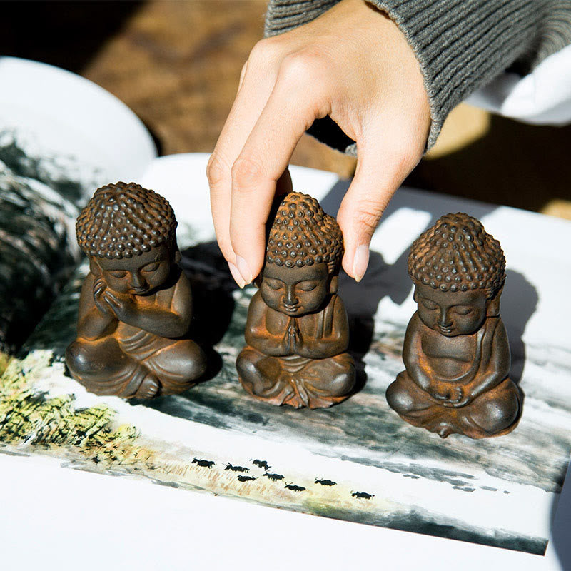 Small Sakyamuni Statue – side angle showing seated posture and compact lotus base form