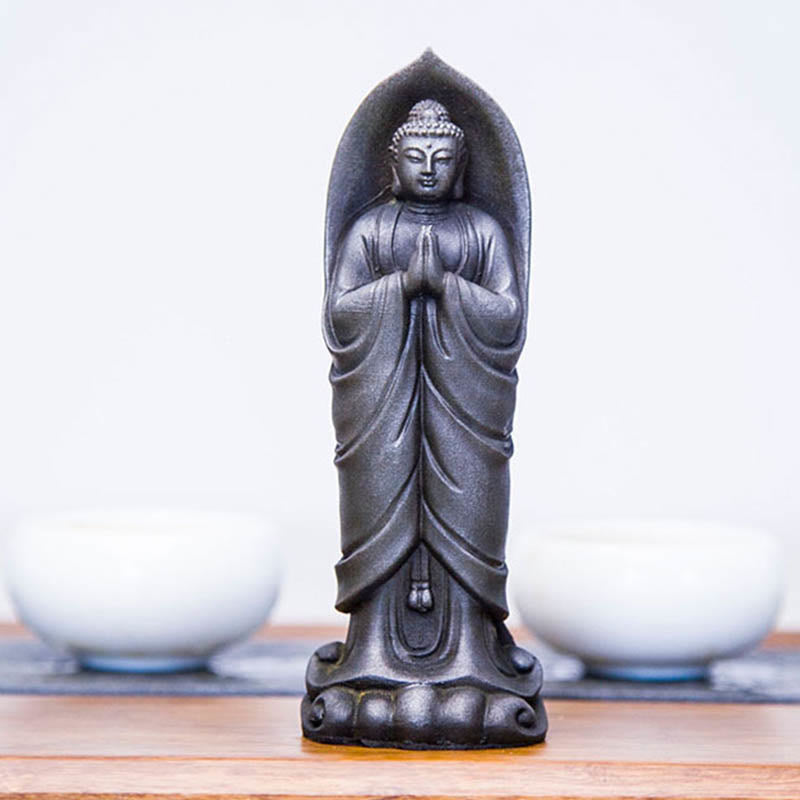 Sakyamuni Namaste Statue – outdoor garden shelf with statue among potted green plants