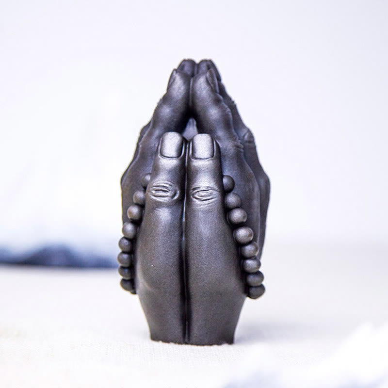 Buddha Hand Namaste Statue – close-up of sleeve fold layers with carved floral pattern