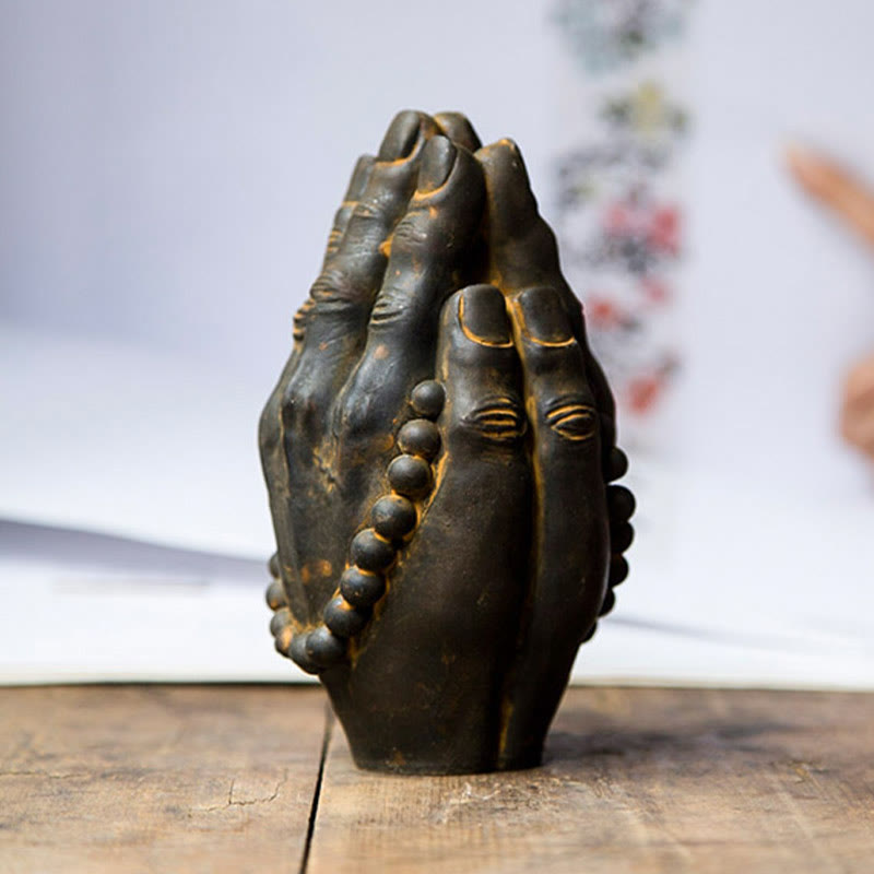 Buddha Hand Namaste Statue – side angle showing curved wrist and flowing sleeve drape
