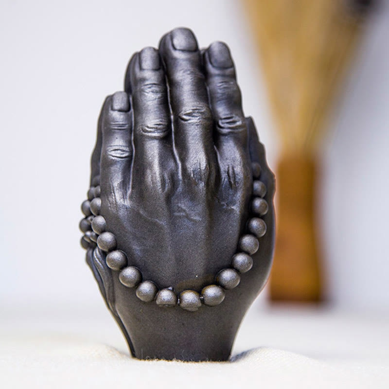 Buddha Hand Namaste Statue – overhead view showing oval base and centered palm join