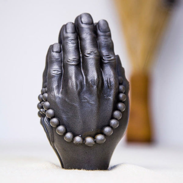 Buddha Hand Namaste Statue – overhead view showing oval base and centered palm join