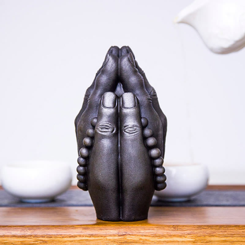 Buddha Hand Namaste Statue – side light creating shadow emphasizing three-dimensional form