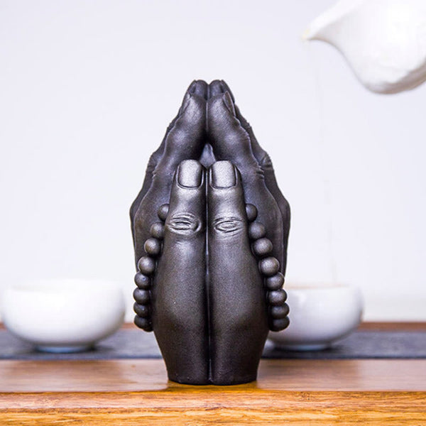 Buddha Hand Namaste Statue – side light creating shadow emphasizing three-dimensional form