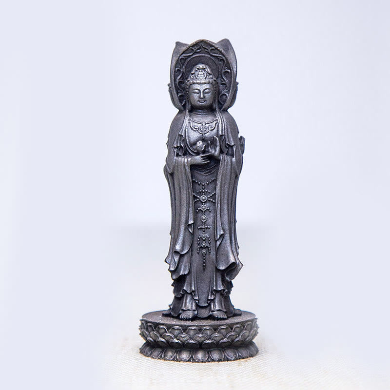 Three-Sided Kwan Yin Statue – statue on office desk with tea set for mindful workspace