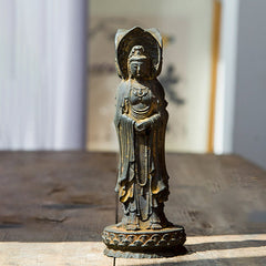 Three-Sided Kwan Yin Statue – front face of compassion with gentle smile and flowing veil