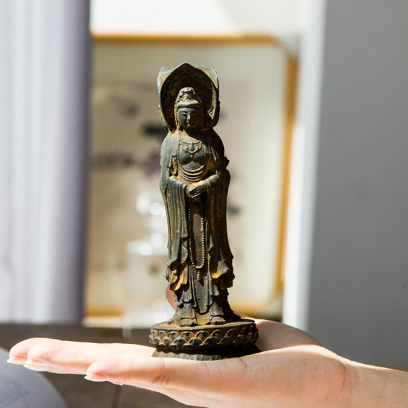 Three-Sided Kwan Yin Statue – right face of power with determined protective gaze detail