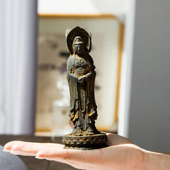 Three-Sided Kwan Yin Statue – right face of power with determined protective gaze detail