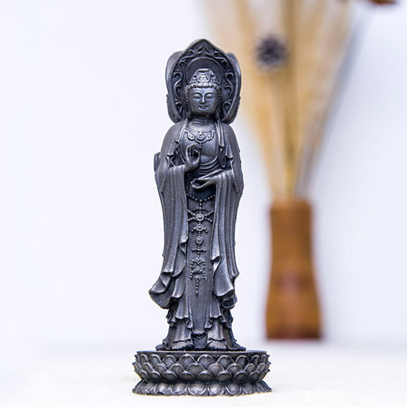 Three-Sided Kwan Yin Statue – overhead view of triangular face layout and symmetry axis