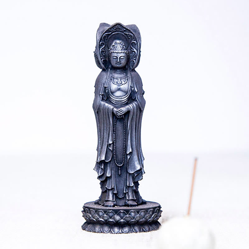 Three-Sided Kwan Yin Statue – paired with prayer wheel and sutra book on altar cloth