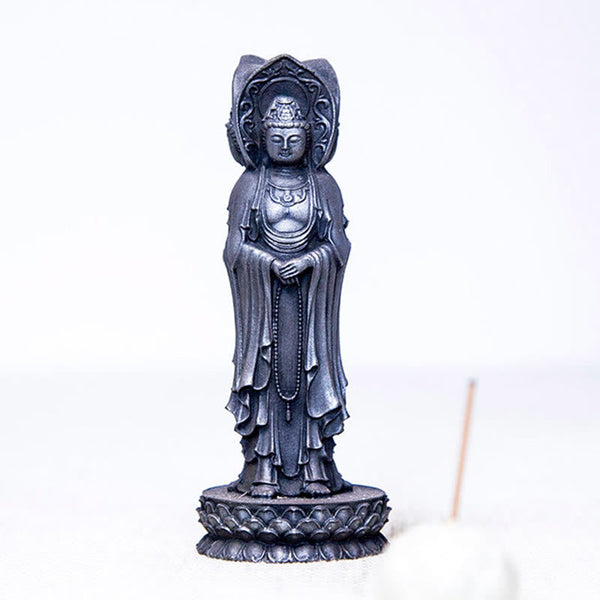 Three-Sided Kwan Yin Statue – paired with prayer wheel and sutra book on altar cloth