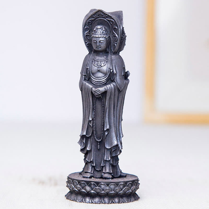 Three-Sided Kwan Yin Statue – meditative corner arrangement with candle stones and statue