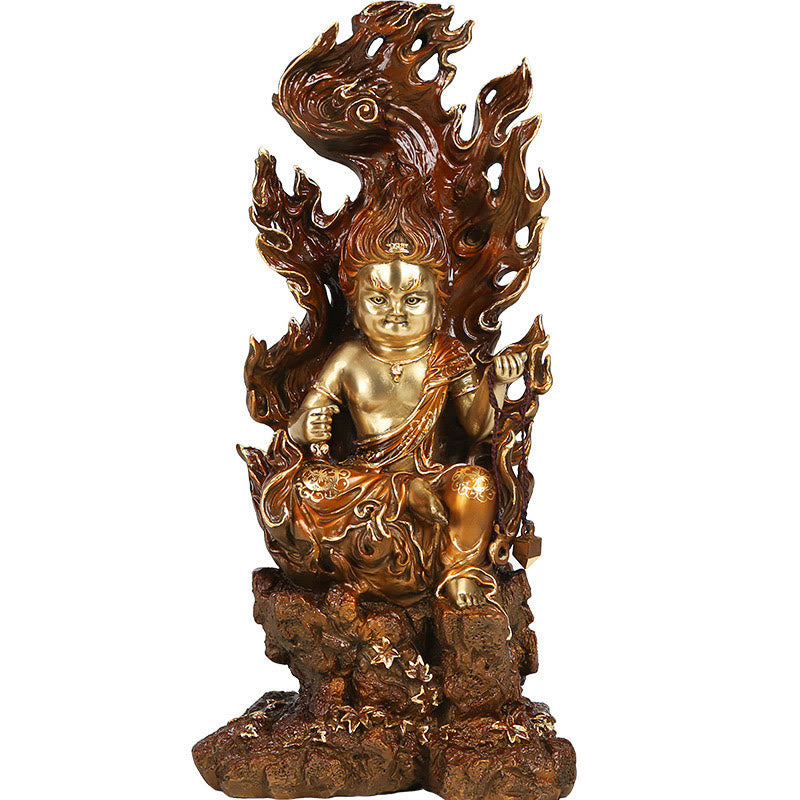 Acalanatha Buddha Statue – statue placed on meditation cushion with incense and prayer beads