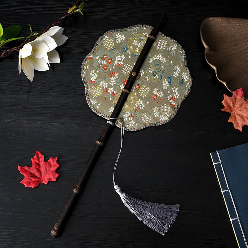 Purple Bamboo Handle Fan – Gold-green brocade with scalloped edge, folding fan