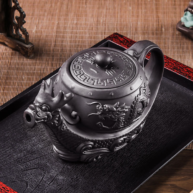 Vintage Dragon Auspicious Clouds Teapot – black dragon teapot on red-edged lacquer tray, geometric lid pattern detail