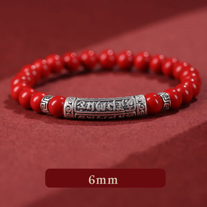 Cinnabar Sterling Silver Six True Words Bracelet – close-up on burgundy fabric, silver engraved barrel, 6mm bead