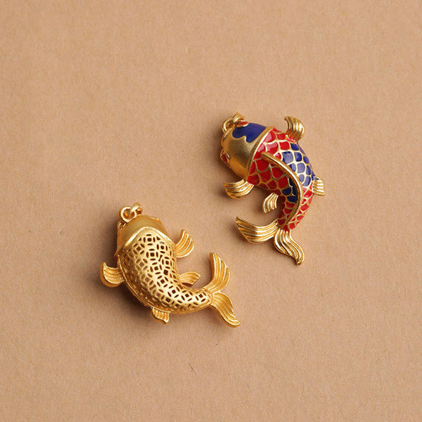 Colorful Koi Fish Hollow Bell Key Chain - two koi charms comparison, gold filigree and red-blue enameled on beige