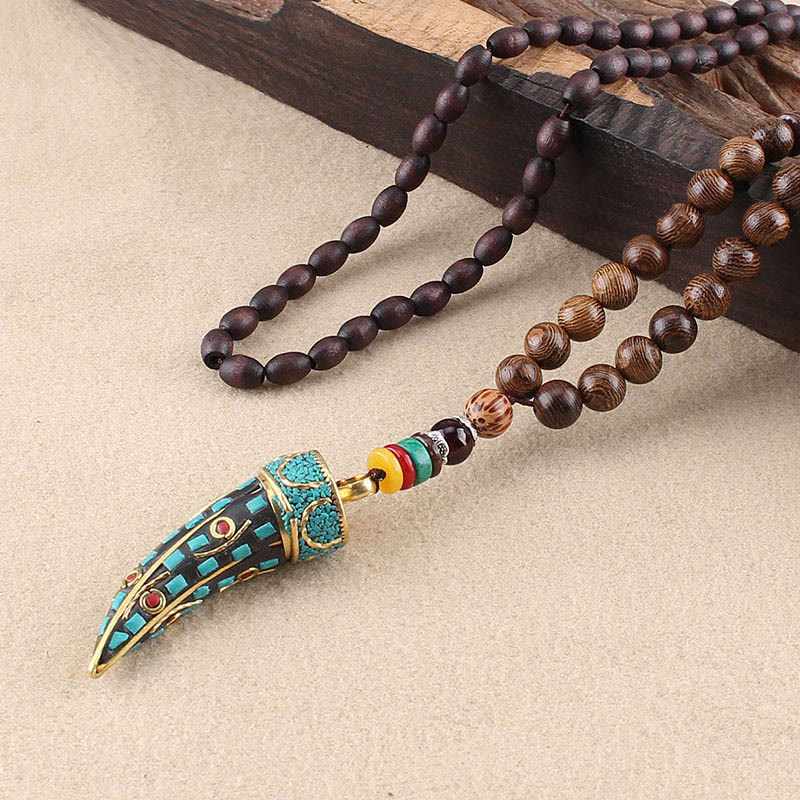Wenge Wood Horn Pendant Necklace – Turquoise horn pendant on rustic wood prop, artisan necklace