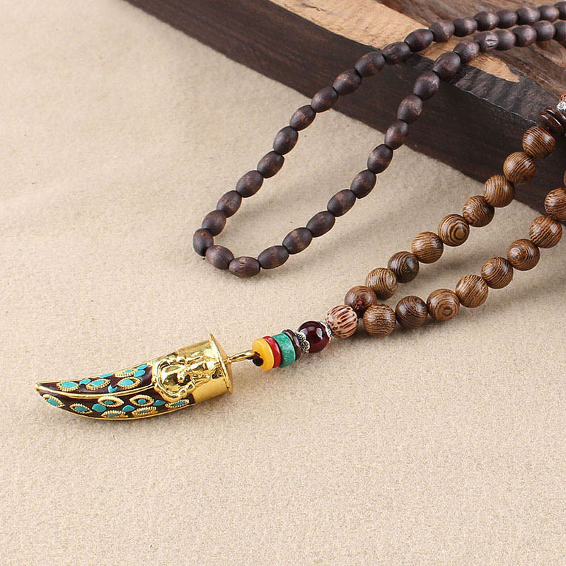 Wenge Wood Horn Pendant Necklace – Peacock-eye turquoise pendant on beige fabric, carved jewelry