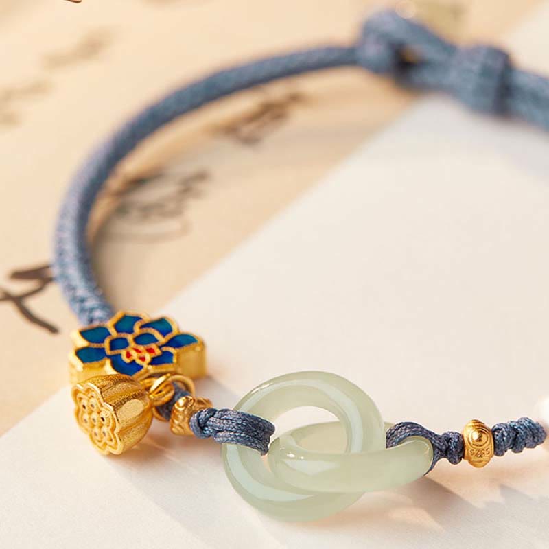 Jade Ring Bracelet on Blue Cord – Cloisonne flower charm macro detail, jade bracelet