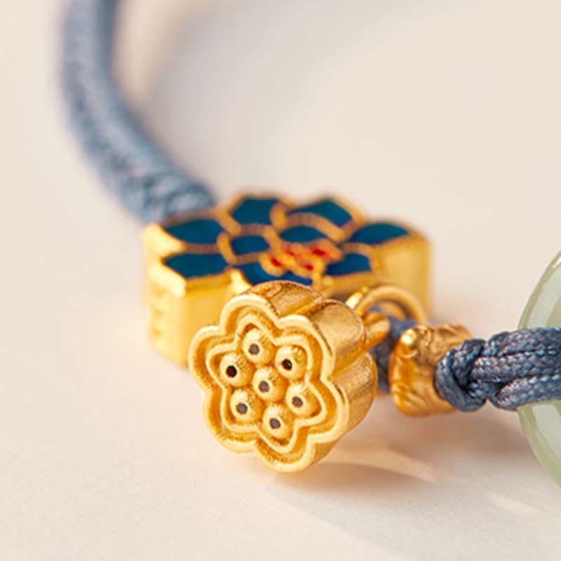 Enamel Flower and Lotus Pod – Gold cloisonne charm macro on blue cord, jade bracelet