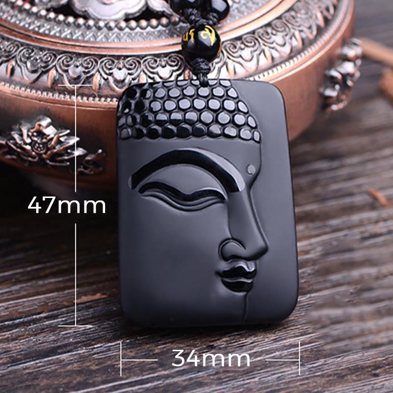 Natural Black Obsidian Buddha Prayer Necklace – size scale in hand, substantial weight and palm-fitting dimension