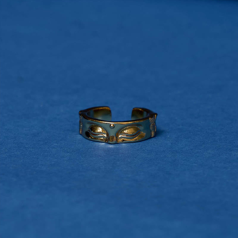 Golden Meditation Buddha Ring – golden buddha serene expression macro, detailed buddha ring face