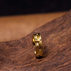 Golden Meditation Buddha Ring – side angle buddha figure on ring, golden meditation ring profile