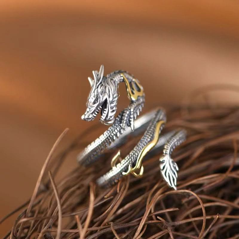 Vintage Dragon Copper Ring | Strength & Wisdom – coiled dragon ring on natural twig nest, earthy