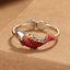 Koi Fish Wealth Prosperity Ring - silver adjustable band with red-orange enamel koi scales and golden fins on kraft paper