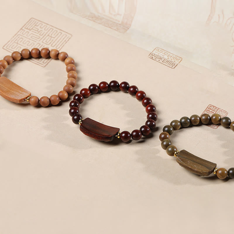 Sandalwood Six True Words Bracelet - Three wood tone options with carved mantra plaques, Buddhist bracelet