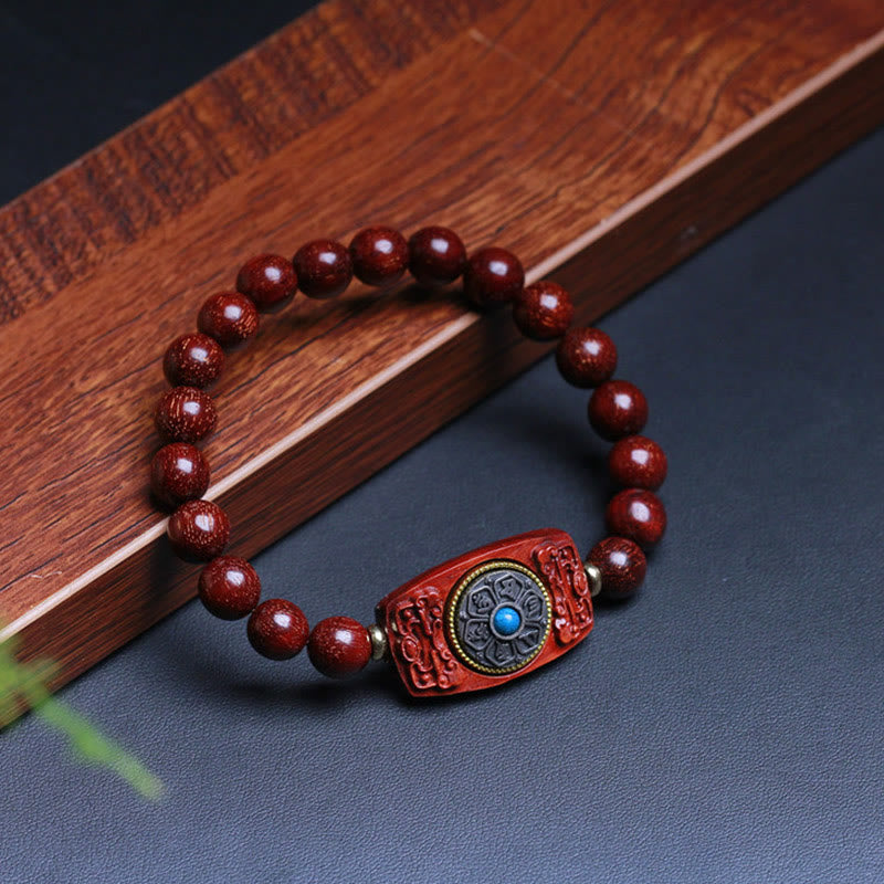 Sandalwood Six True Words Bracelet - Turquoise-centered mantra plaque on red wood beads, healing bracelet