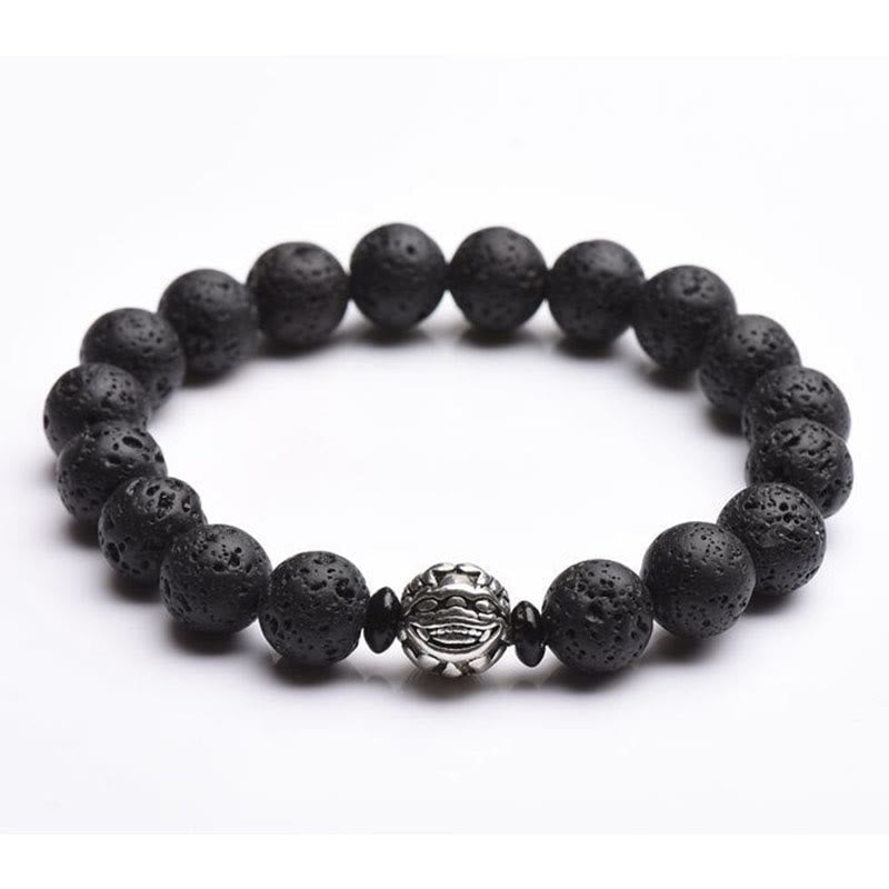 Lava Rock PiXiu Bracelet white background detail, silver carved center bead, volcanic stone, wealth amulet