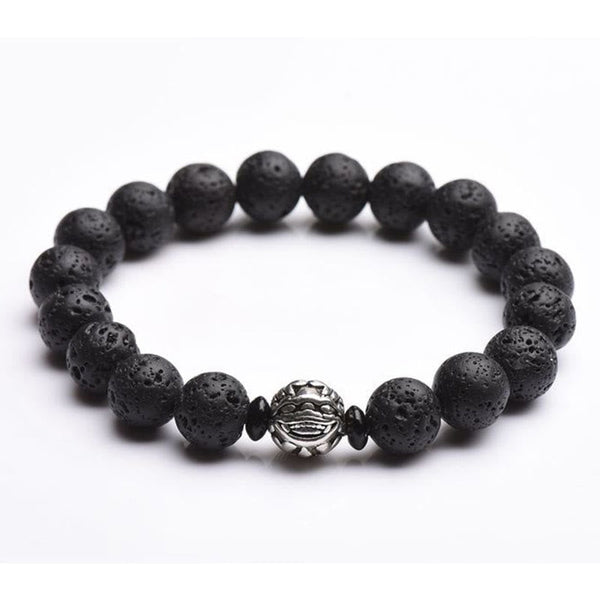 Lava Rock PiXiu Bracelet white background detail, silver carved center bead, volcanic stone, wealth amulet