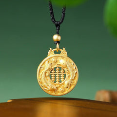 Gold Plated Copper Koi Fish Pendant – twin koi and abacus gold pendant on black cord, green and wood background
