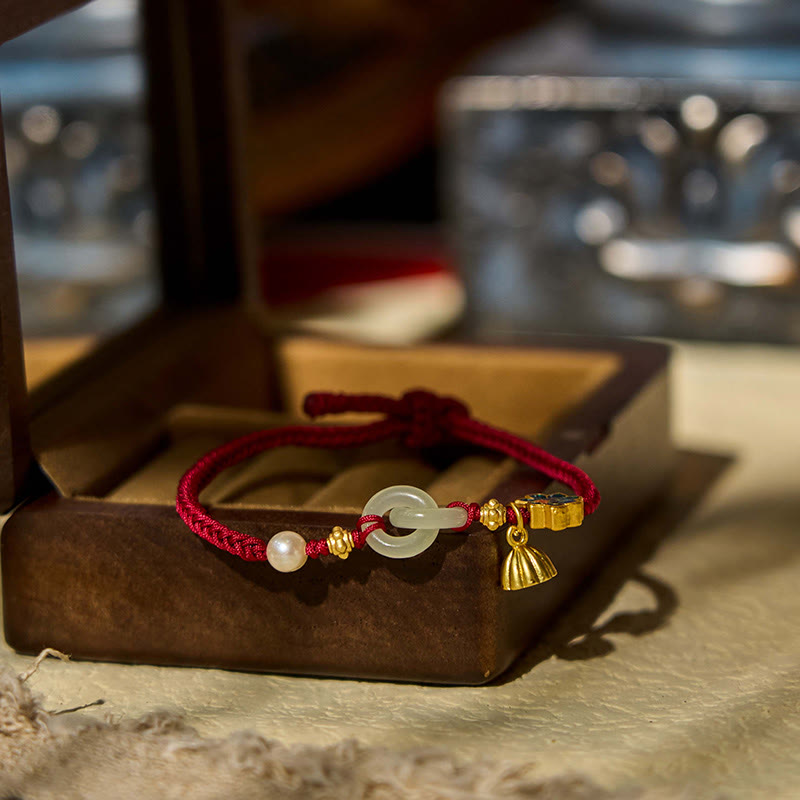 Jade Interlocking Ring Bracelet – Lotus pod charm on red cord in gift box, jade bracelet