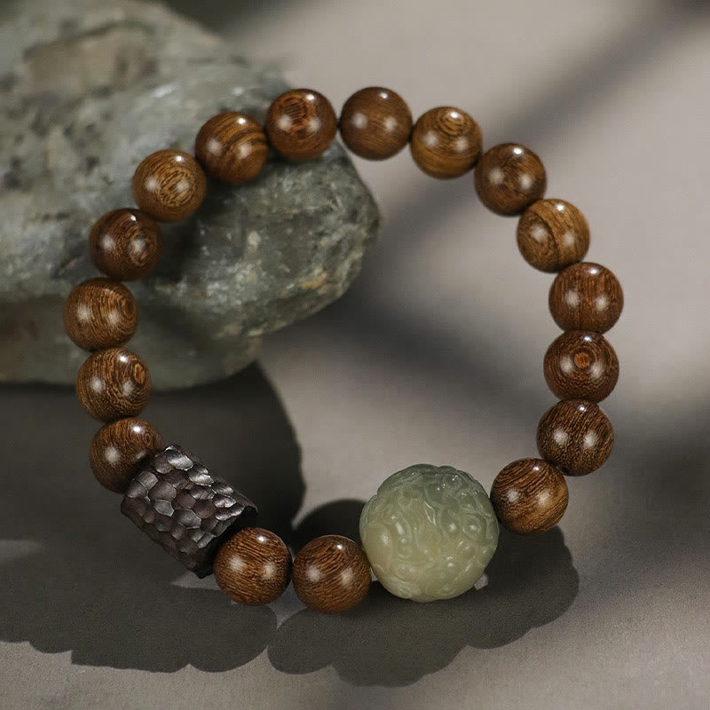 Sandalwood Jade PiXiu Bracelet with gray stone prop, carved green jade bead, hammered dark spacer, zen