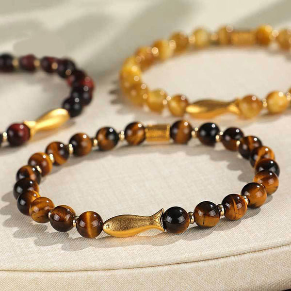 Tiger Eye Koi Fish Courage Bracelet – three bracelets on natural linen, brown golden red tones, gold fish charms