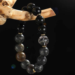 Onyx Obsidian Tiger Eye Bracelet – beaded bracelet draped on driftwood with clear quartz focal bead, men jewelry