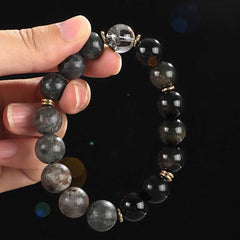 Onyx Obsidian Tiger Eye Bracelet – hand-held multi-stone beads showing wrist scale, crystal healing bracelet