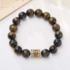 Tiger Eye Six True Words Courage Bracelet - top-down view on white background, golden beads