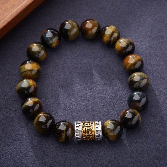 Tiger Eye Six True Words Courage Bracelet - full view on dark fabric, beaded stretch design