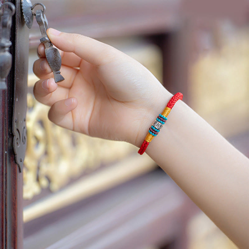 Om Mani Padme Hum Bracelet – Worn at traditional doorway, lifestyle