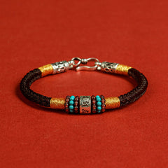 Om Mani Padme Hum Bracelet – Black cord with gold wraps, braided