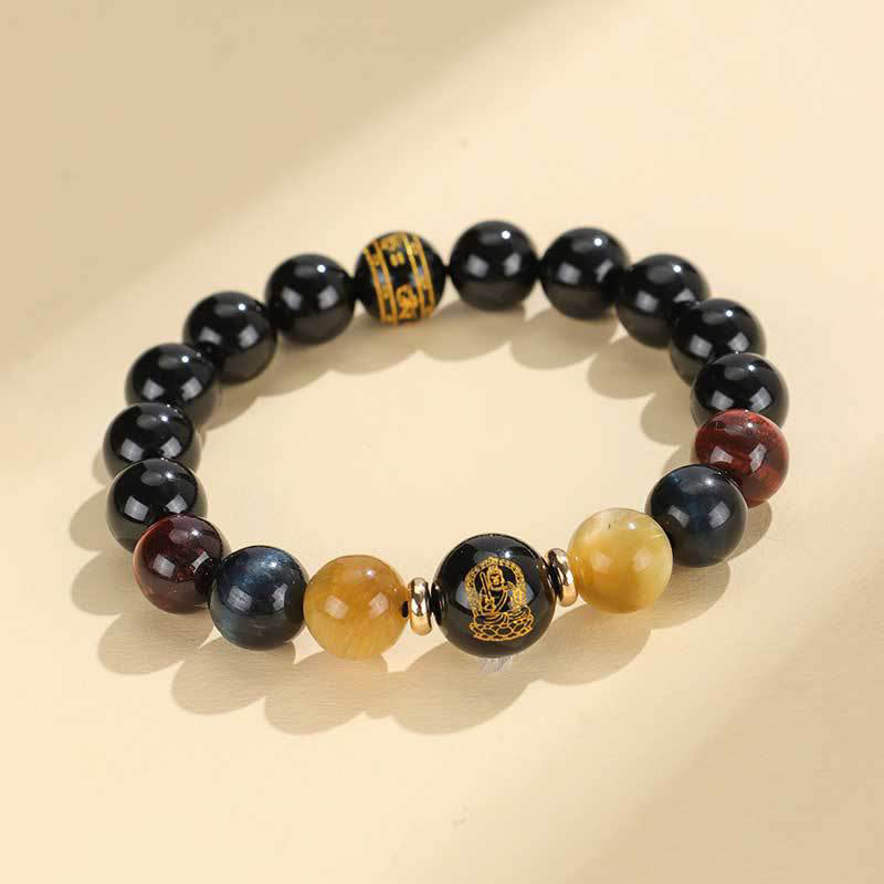 Black Onyx Tiger Eye Natal Buddha Bracelet - gold Buddha and mantra focal beads