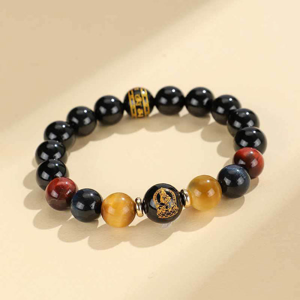 Black Onyx Tiger Eye Natal Buddha Bracelet - gold deity and script detail beads