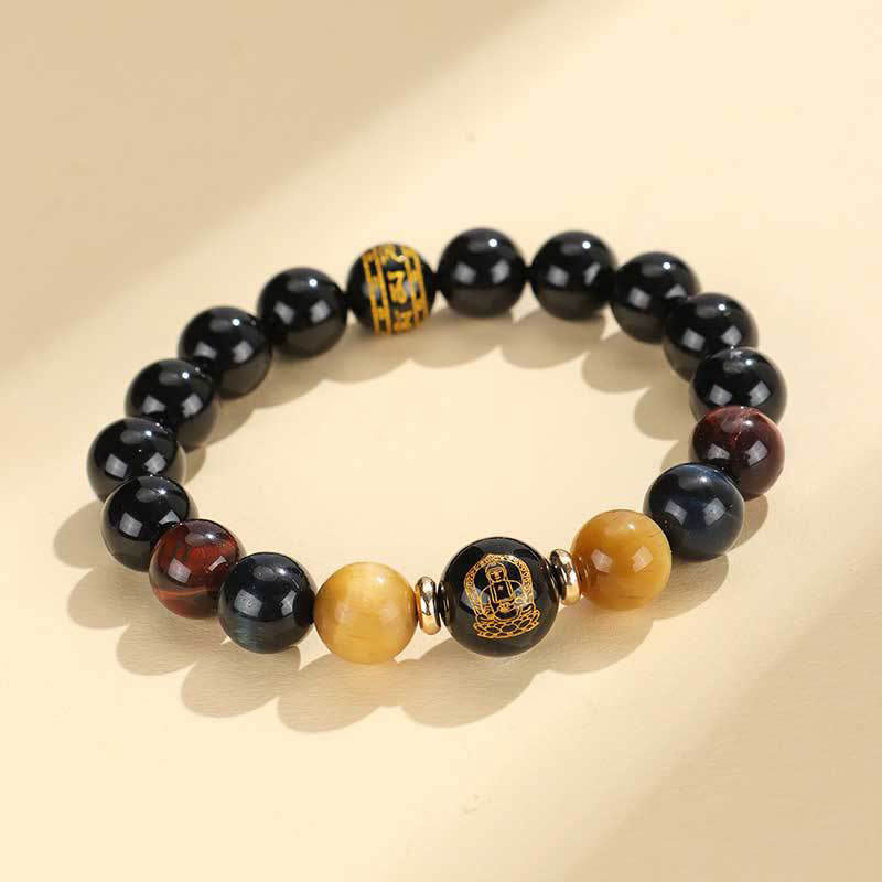 Black Onyx Tiger Eye Natal Buddha Bracelet - gold deity bead, multi-color tiger eye