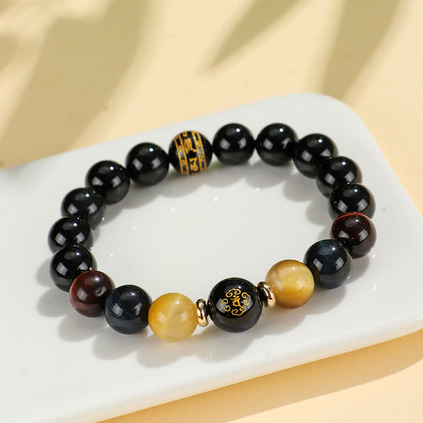 Black Onyx Tiger Eye Natal Buddha Bracelet - gold symbol beads, red tiger eye detail