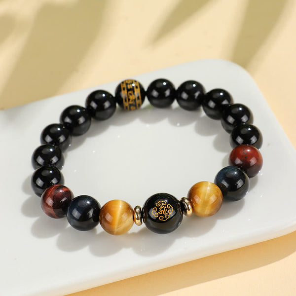 Black Onyx Tiger Eye Natal Buddha Bracelet - gold character engraving on black focal bead